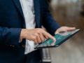 businessman checking chart on digital tablet