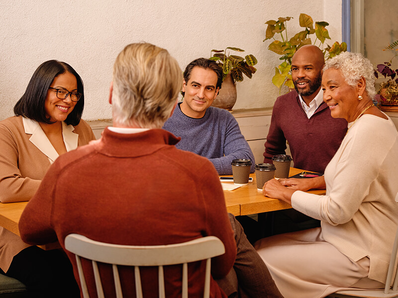 women smiling at work image