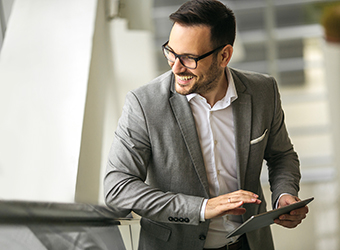 young business man holding digital tablet